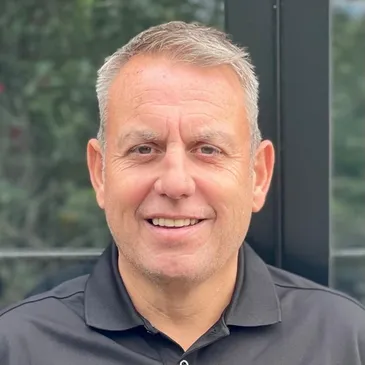 Nathan smiling directly at the camera.